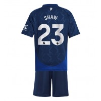 Maglie da calcio Manchester United Luke Shaw #23 Seconda Maglia Bambino 2024-25 Manica Corta (+ Pantaloni corti)